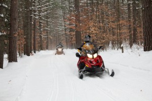 Snowmobiling at White Lake State Park on 12/17/13”.  Courtesy NH Division of Parks & Recreation/Grant Klene.